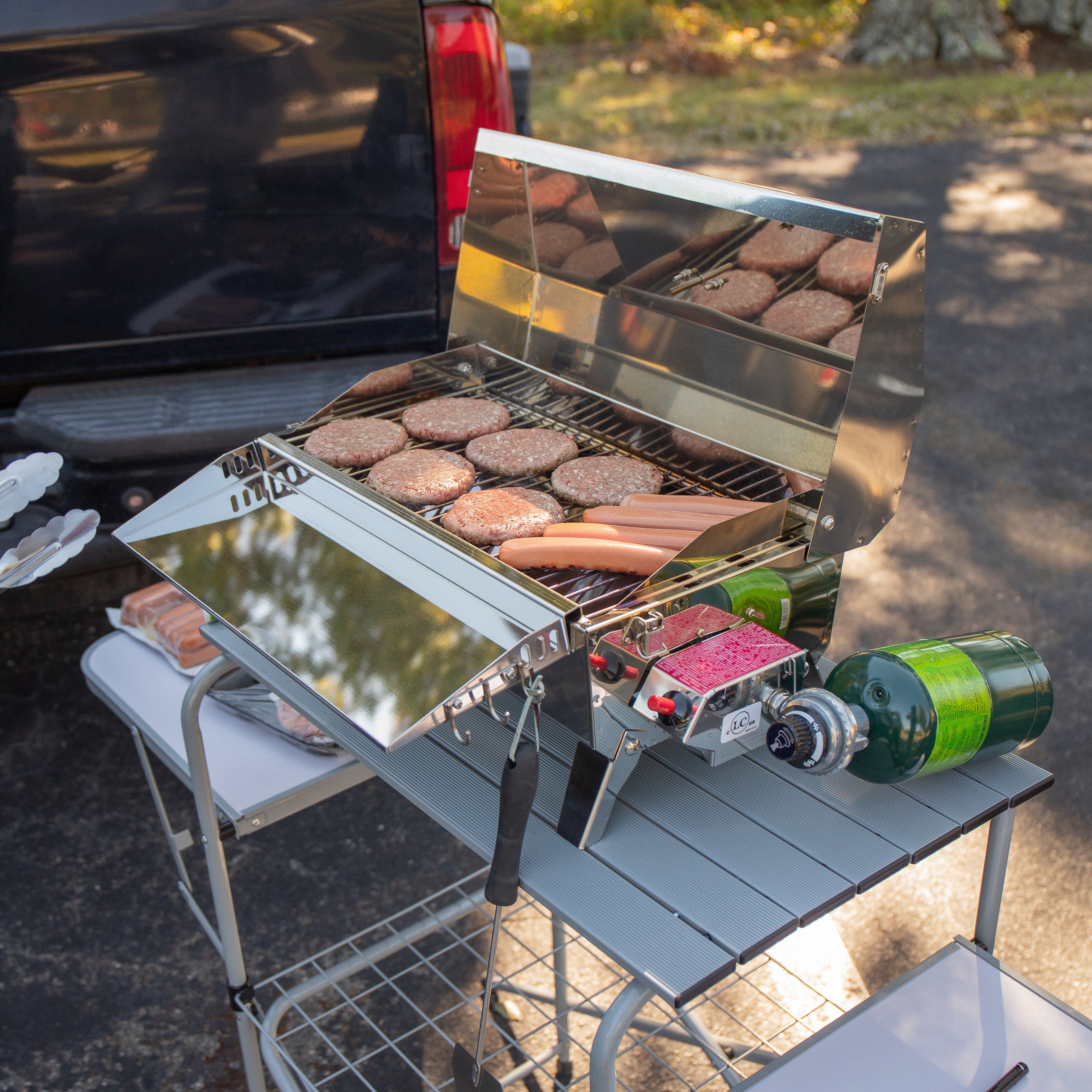 Camco Deluxe Folding Outdoor Steel Grill Table with Side Tables, Hooks, and Case - VMInnovations