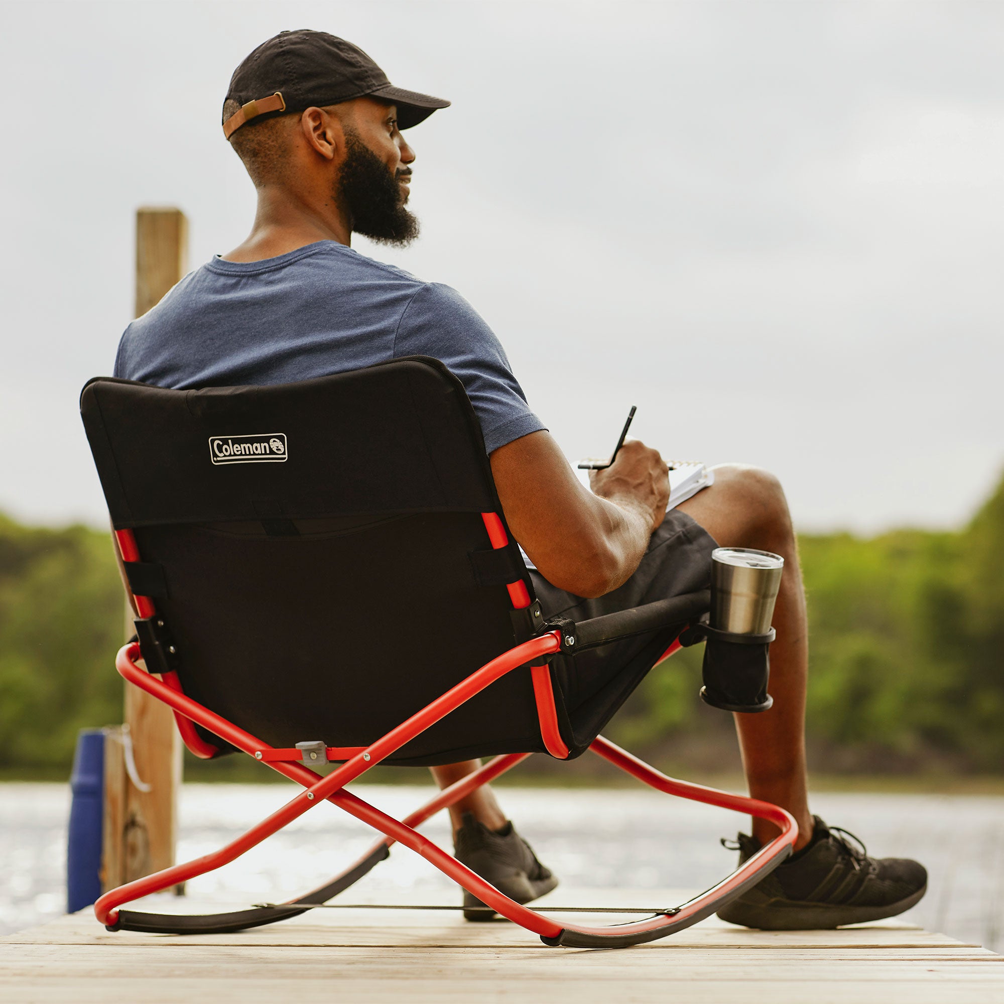 Coleman Cross Rocker Outdoor Foldable Rocking Chair with Padded Arms, Black/Red