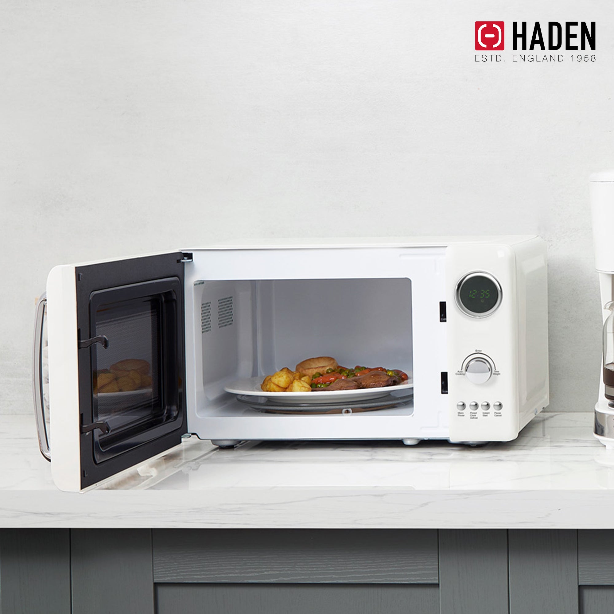 Haden 700 Watt 0.7 Cb Ft Microwave Oven w/Digital Controls, Ivory/Chrome (Used) - VMInnovations