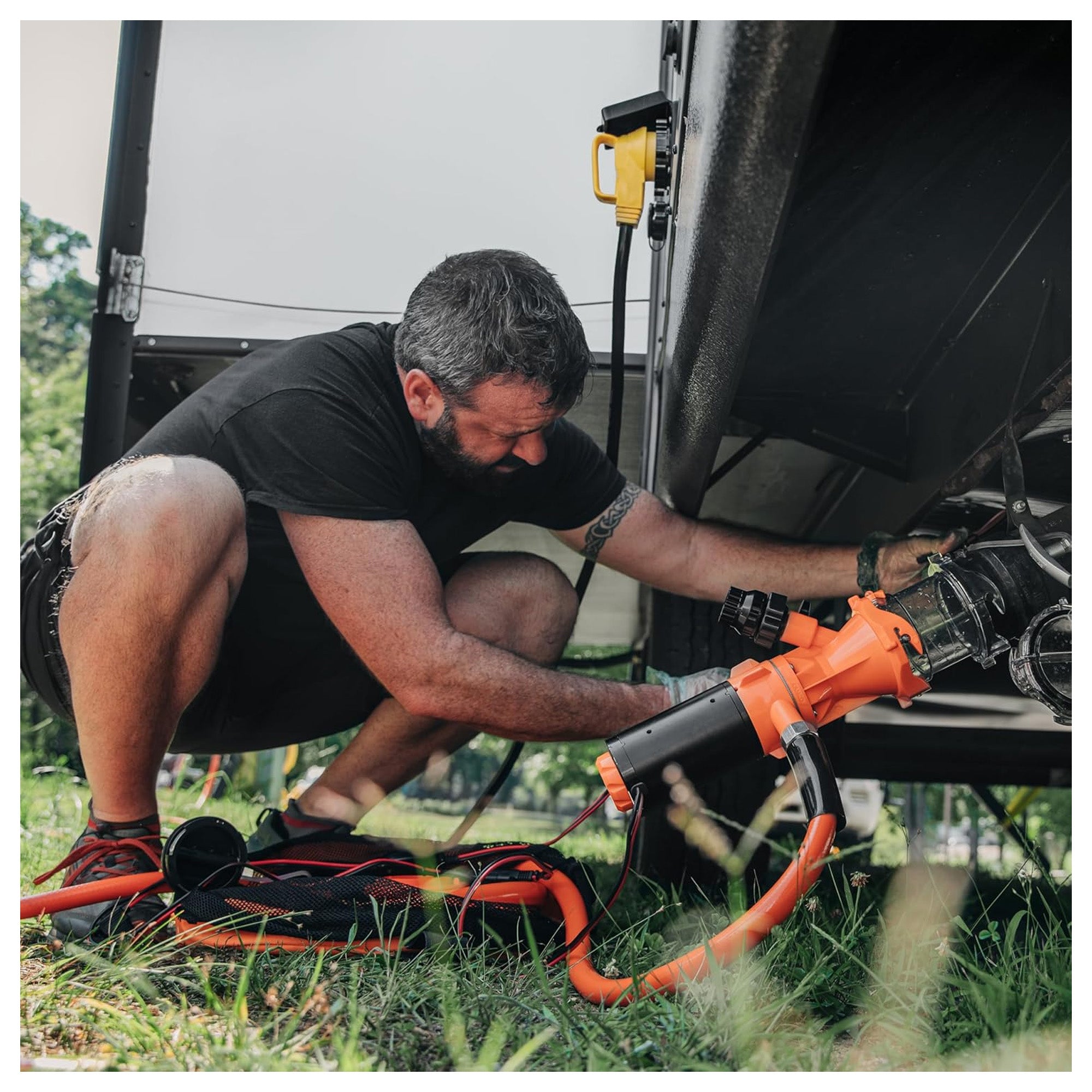 Rhino Sewer Macerator Pump System for Campers or RVs with 4-in-1 Adapter, Orange
