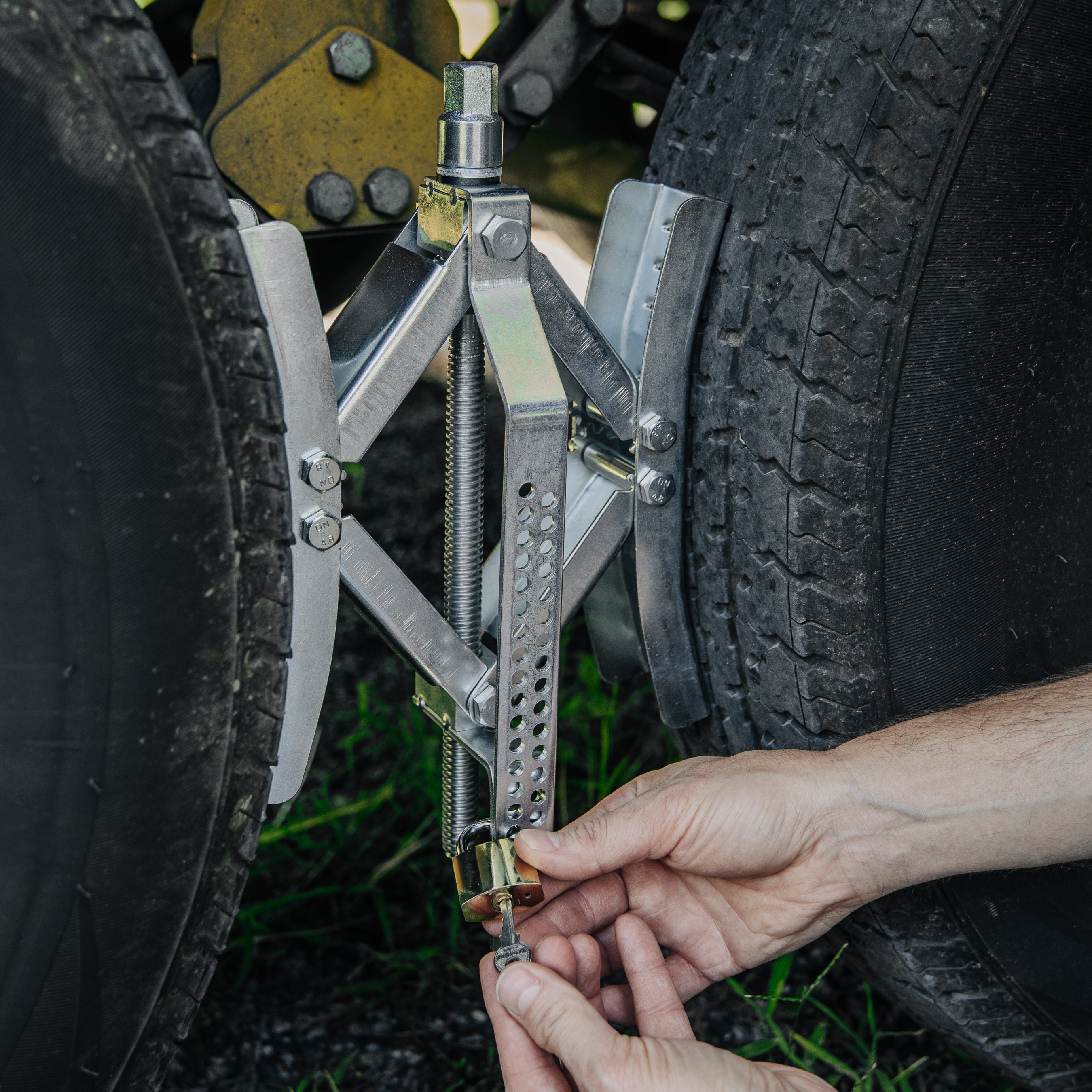 Camco Eaz-Lift 10" Metal Wheel Stop with Lock and Wrench for RV Tires, 2 Pack