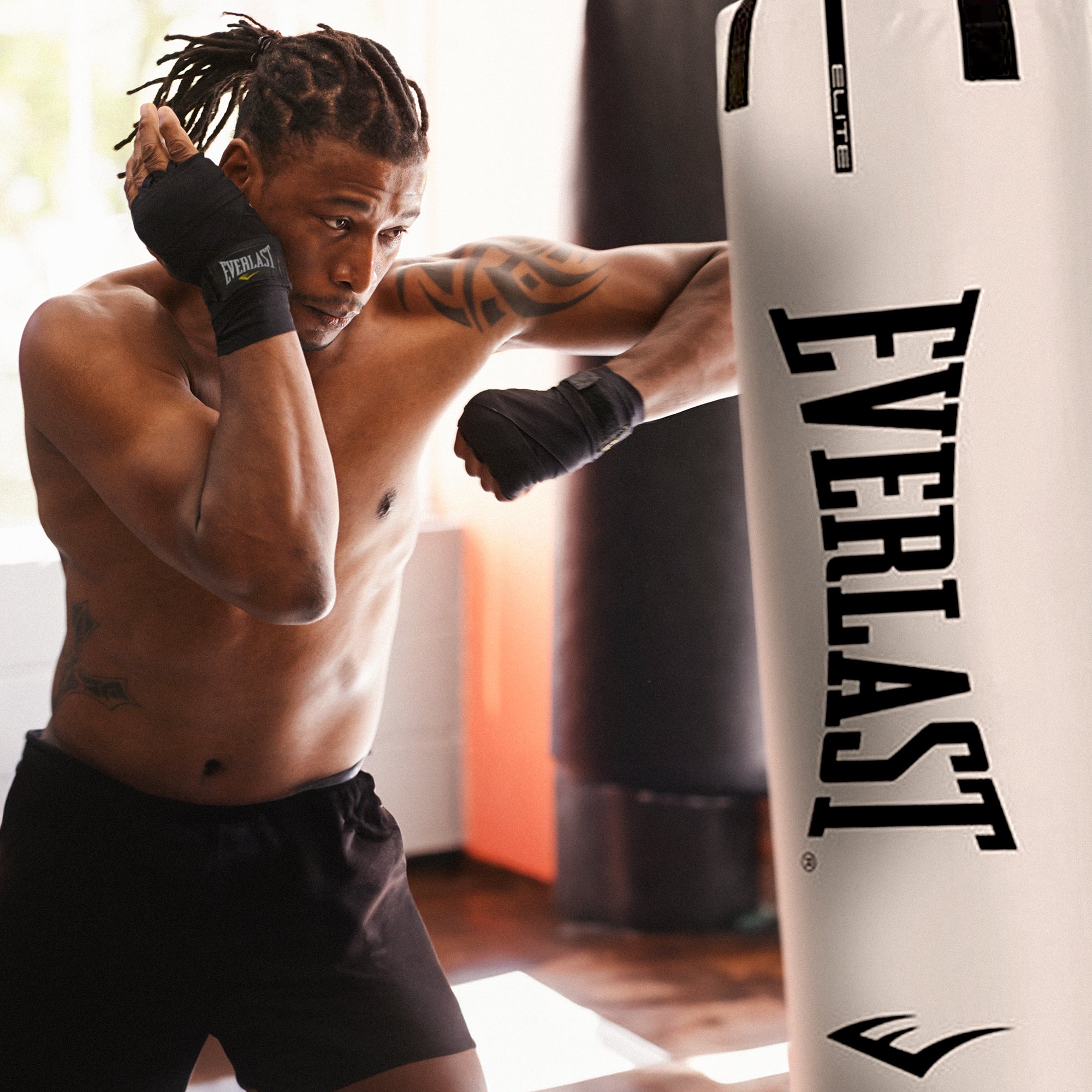 Everlast Elite Nevatear 70 Pound Heavy Bag with Hanging Strap and D Rings, White - VMInnovations