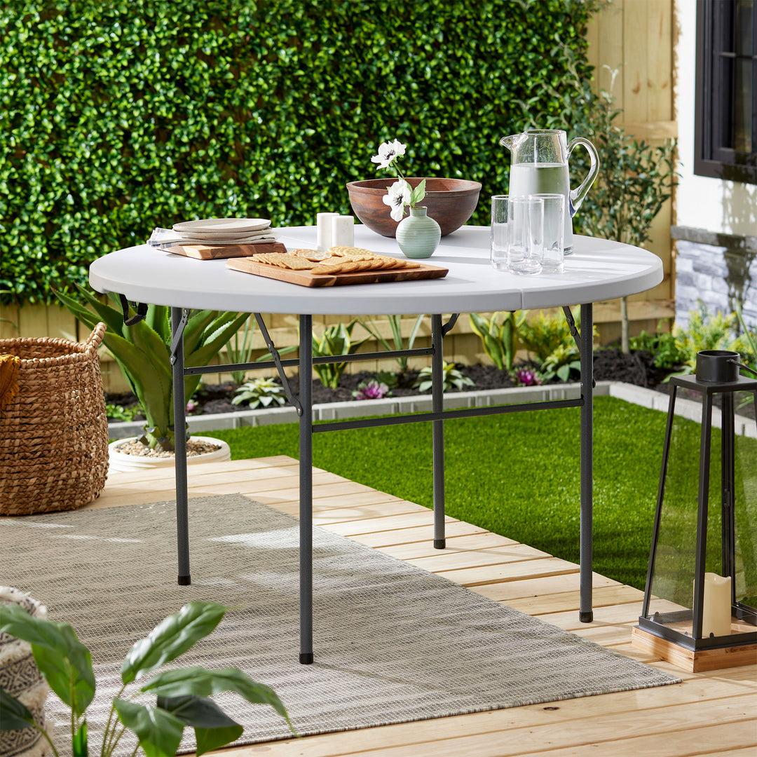 Plastic Development Group 4 Foot Round Fold In Half Folding Banquet Table (Used) - VMInnovations