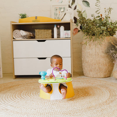 Bumbo Baby Infant Soft Foam Floor Seat with 3 Point Adjustable Harness, Mimosa