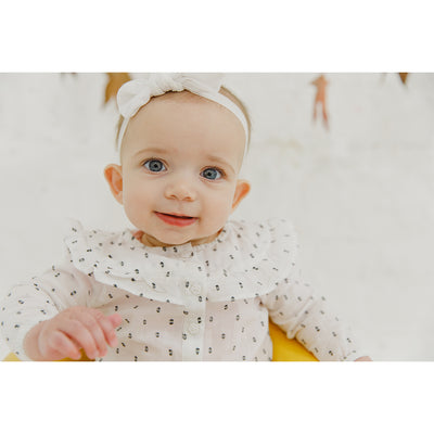 Bumbo Baby Infant Soft Foam Floor Seat with 3 Point Adjustable Harness, Mimosa