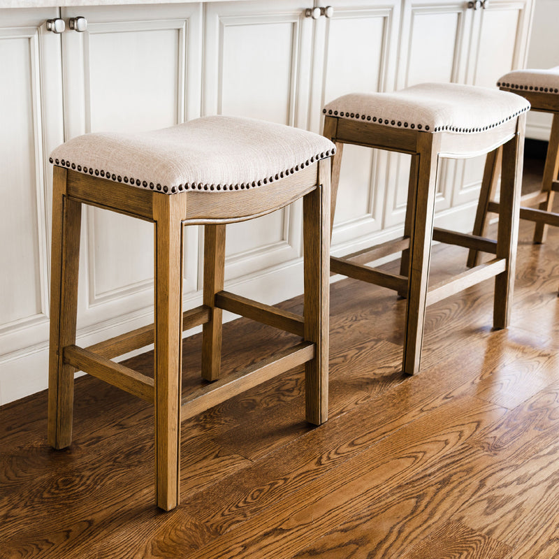 Maven Lane Adrien Saddle Barstool in Natural Wood Finish w/ Wheat Cream Fabric Upholstery