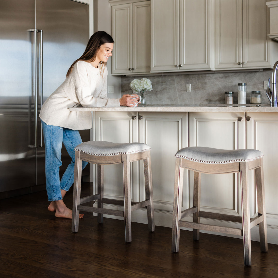 Maven Lane Adrien Saddle Bar Stool in Reclaimed Oak Finish w/ Ash Grey Fabric Upholstery