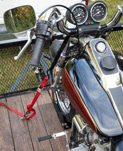 Camco Motorcycle Wheel Chock Mount with Handlebar Straps & Universal Tire Fit