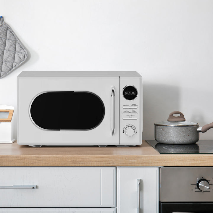 Magic Chef 0.7 Cubic Feet 700 Watt Retro Countertop Microwave, White (Open Box)