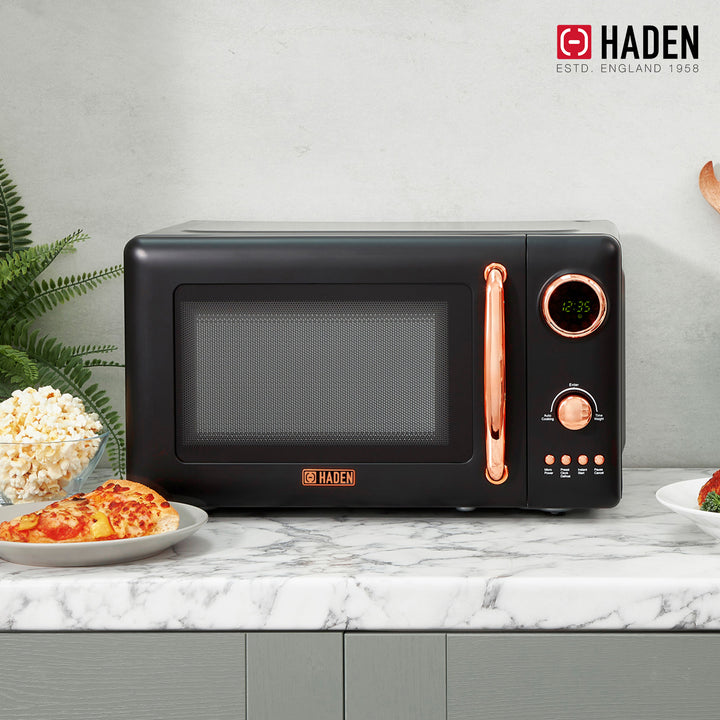 Haden 700 Watt 0.7 Cubic Foot Microwave w/ Digital Controls, Black/Copper (Used)