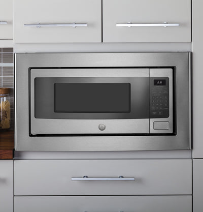 GE PEM31SFSS Profile 1.1 Cu. Ft. Countertop Microwave (Refurbished) (Used)