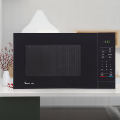 Magic Chef 1000 Watt 1.1 Cu. Ft Digital Touch Countertop Microwave, Black (Used)