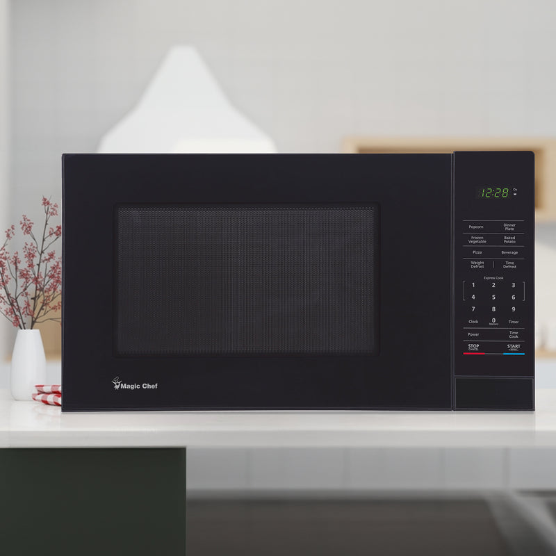 Magic Chef 1000 Watt 1.1 Cu. Ft Digital Touch Countertop Microwave, Black (Used)