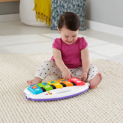 Fisher-Price Deluxe Kick 'n Play Musical Piano Gym with Soft Mat, Pink